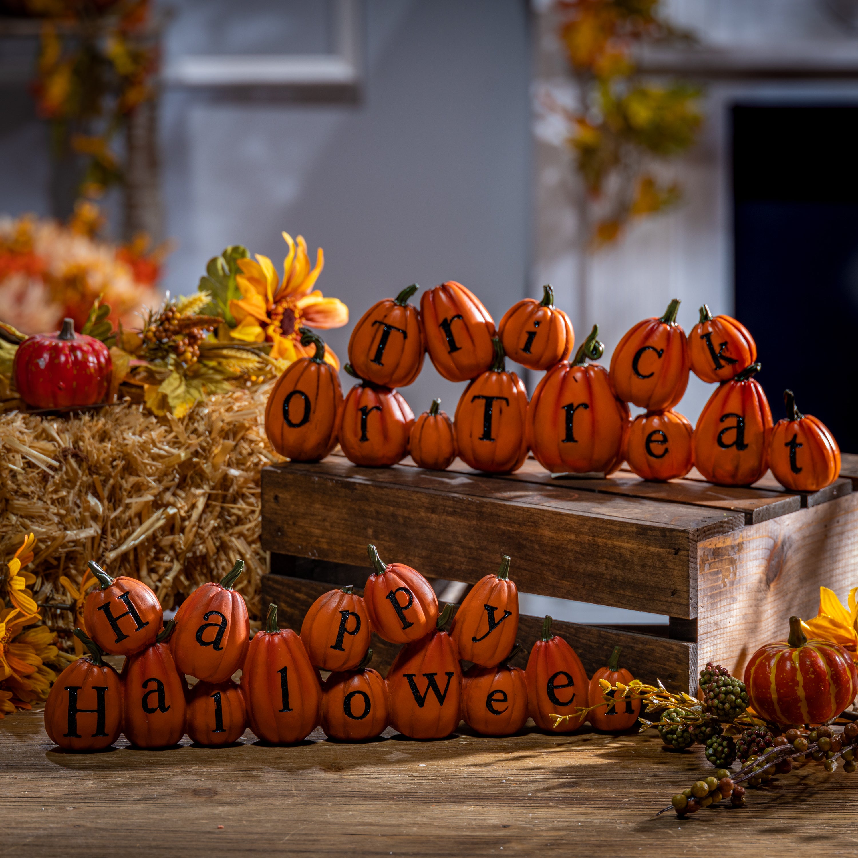 Set of 2 13.7-in Resin Long Pumpkins perched askew spelling out Halloween messages
